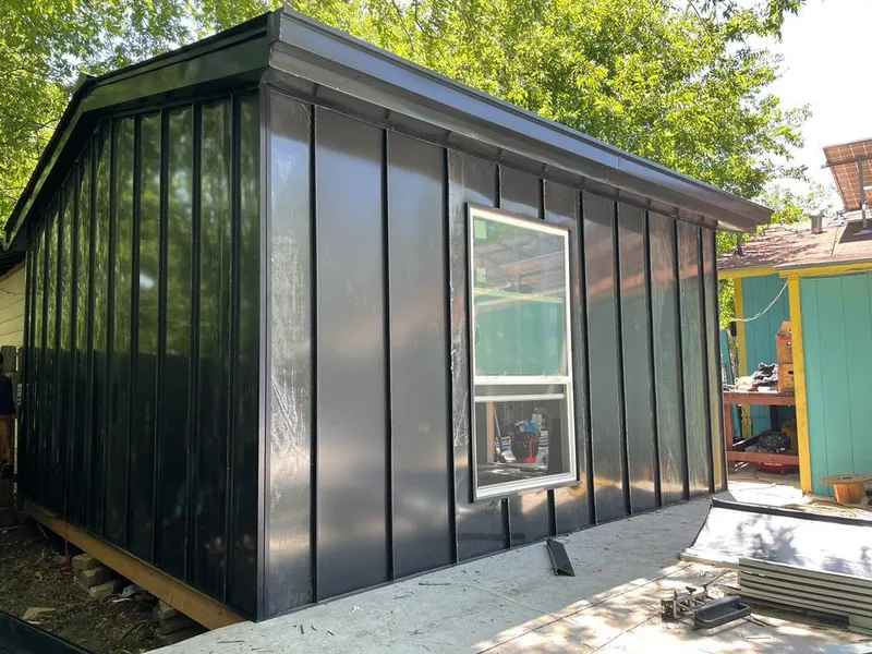 Black standing seam metal wall panels for Roof Inspection in Woodcrest