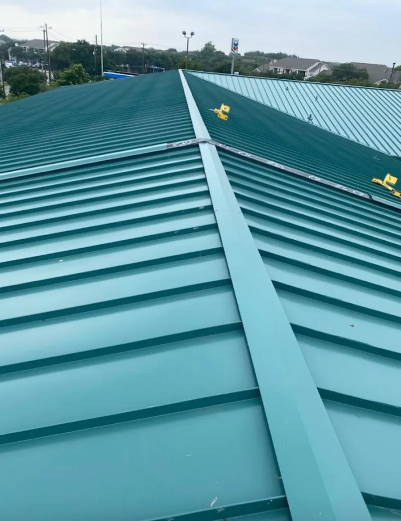 Green commercial metal roof ridge and valley for Metal Roof Repair in Woodcrest