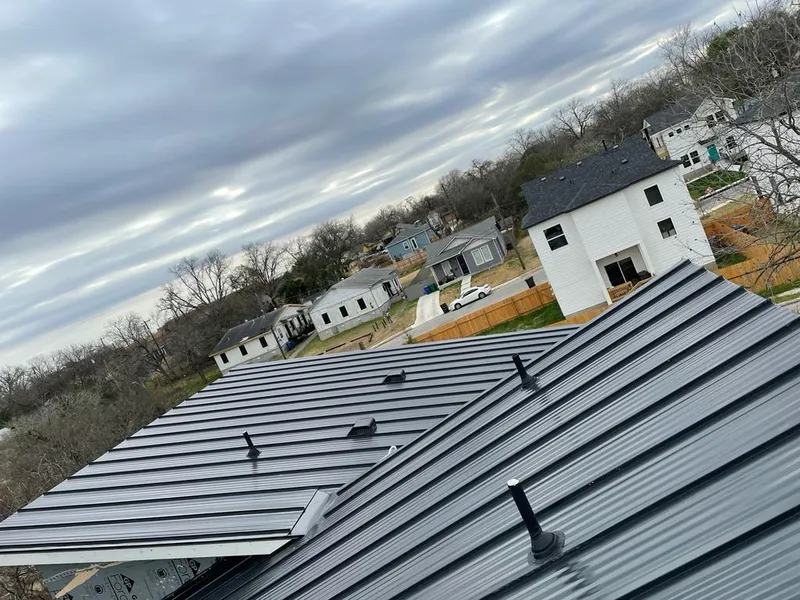 Standing seam metal roof panels with vents for Skylight Repair in Woodcrest